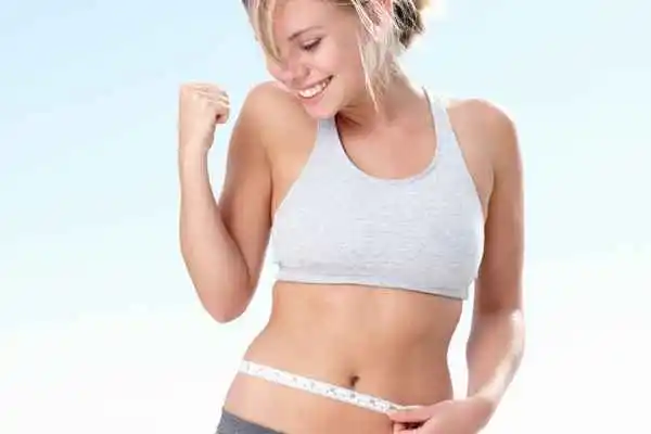 woman happy after fat reduction treatment Warwick