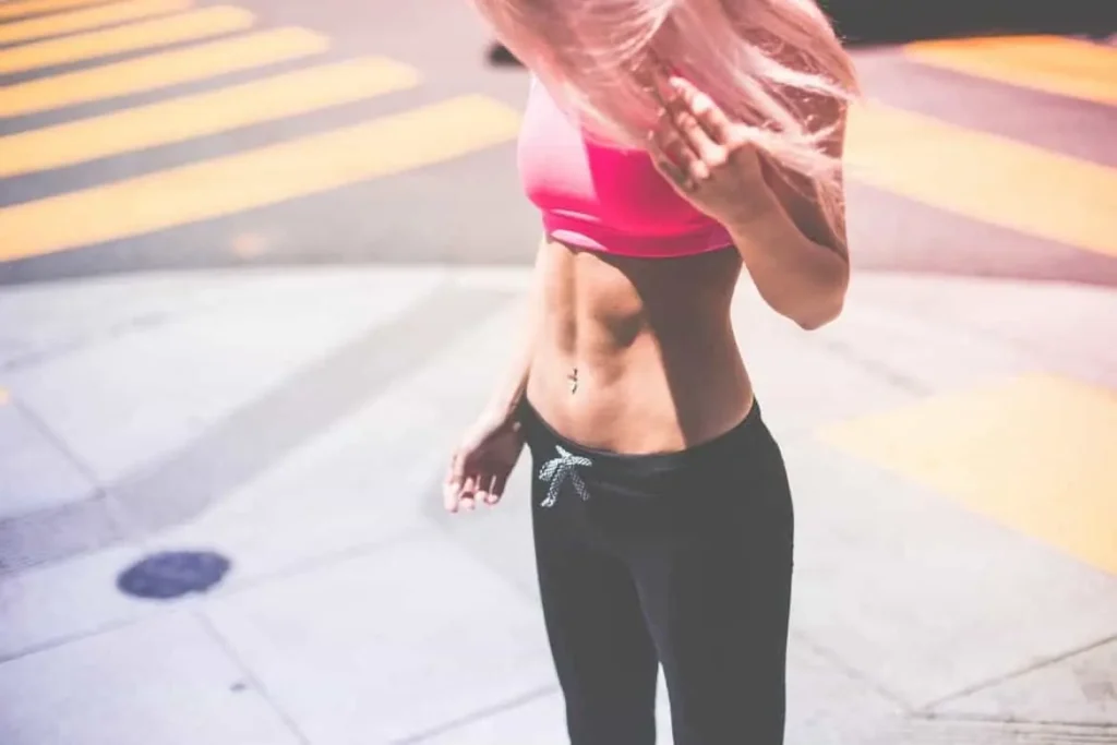 Woman with toned stomach after LA-EMS Body Sculpting Treatment Warwick